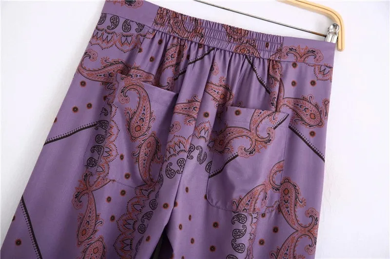 PRINT FLARED TROUSERS
