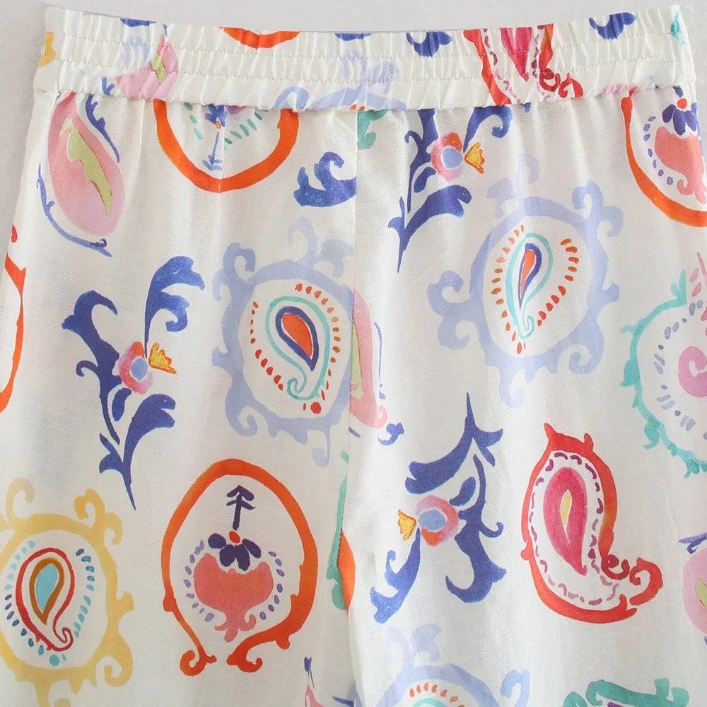 PRINTED FLARED TROUSERS