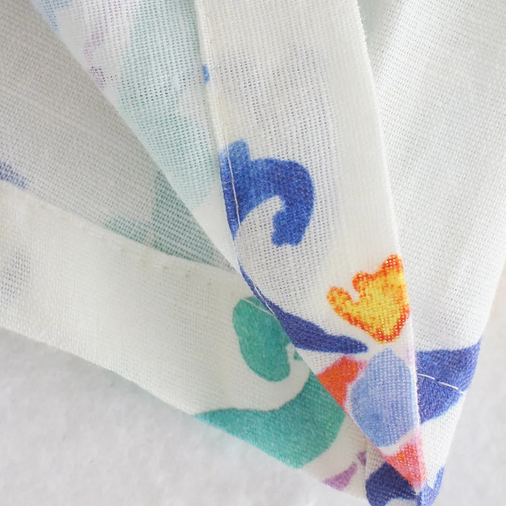 PRINTED FLARED TROUSERS